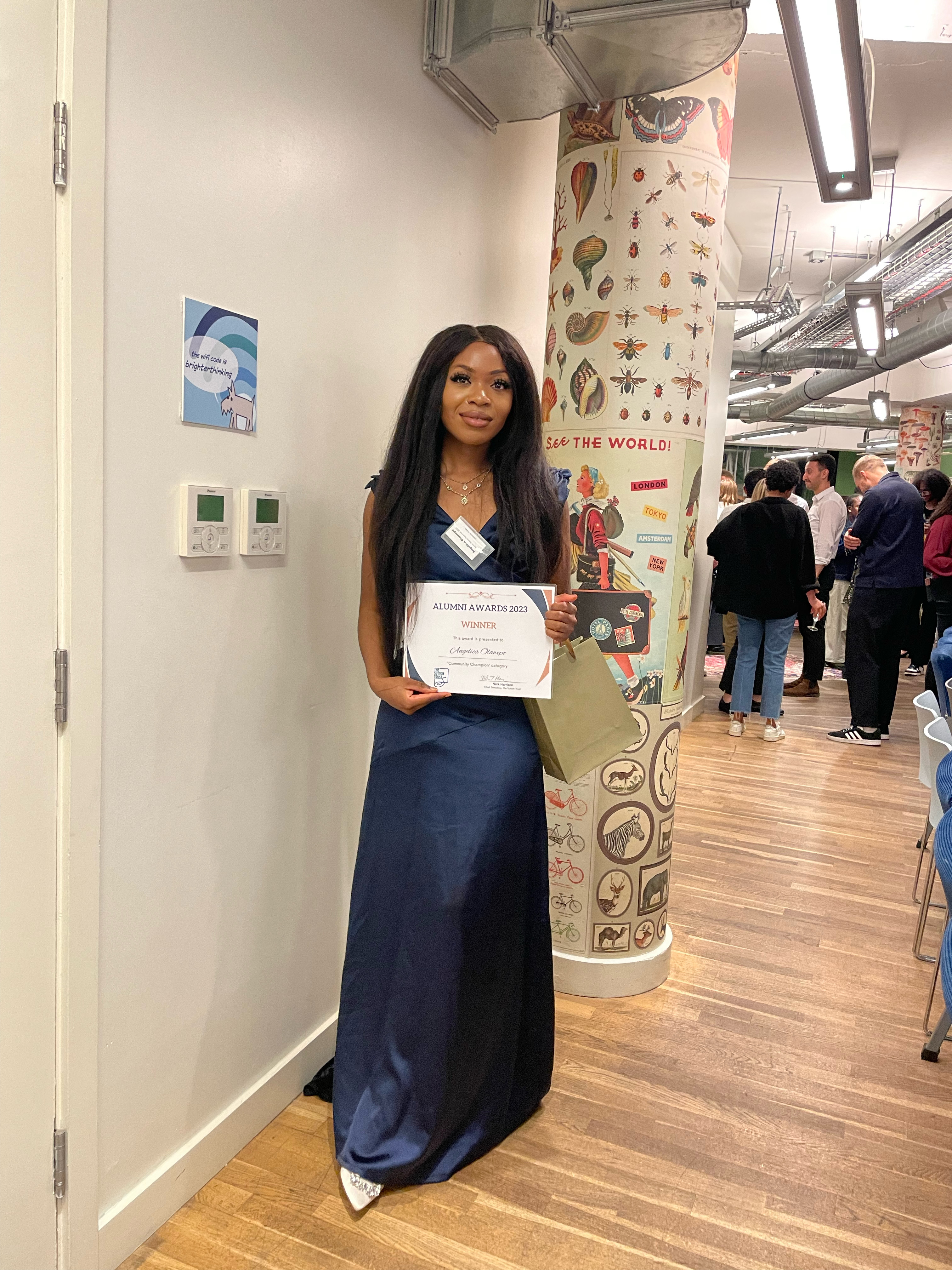 Angelica receiving the Community Champion award at the Sutton Trust Alumni Awards 2023
